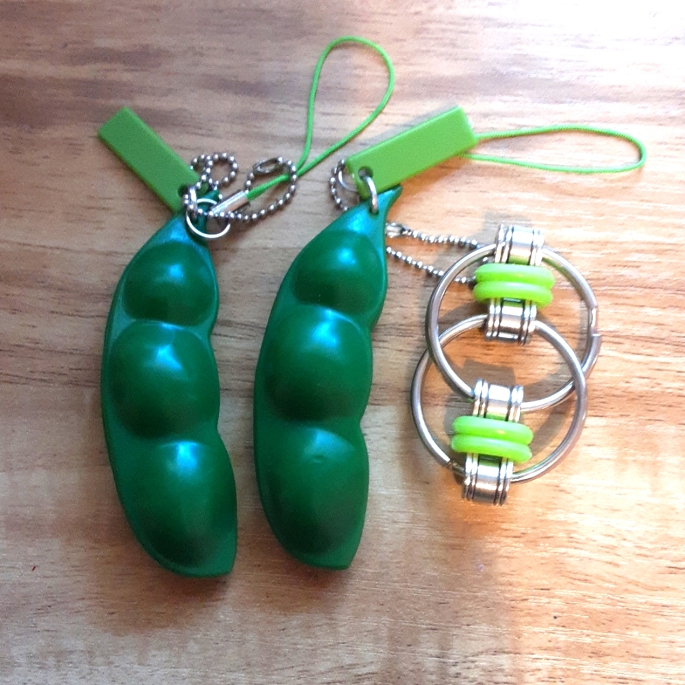 2 pea poppers and 1 green bikechain